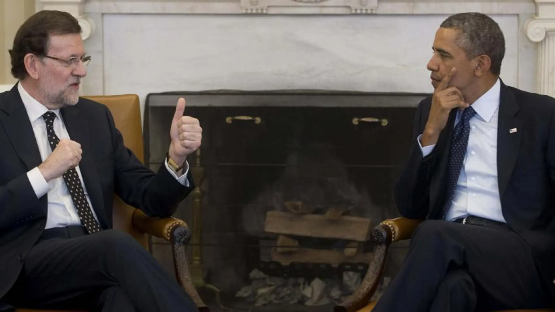 El presidente de Estados Unidos, Barack Obama (d), y el jefe del Gobierno español, Mariano Rajoy, durante la reunión de ayer.