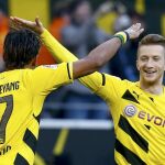 Los jugadores del Borussia Dortmund Pierre-Emerick Aubameyang y Marco Reus