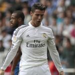 El delantero portugués del Real Madrid Cristiano Ronaldo celebra su primer gol ante el Deportivo