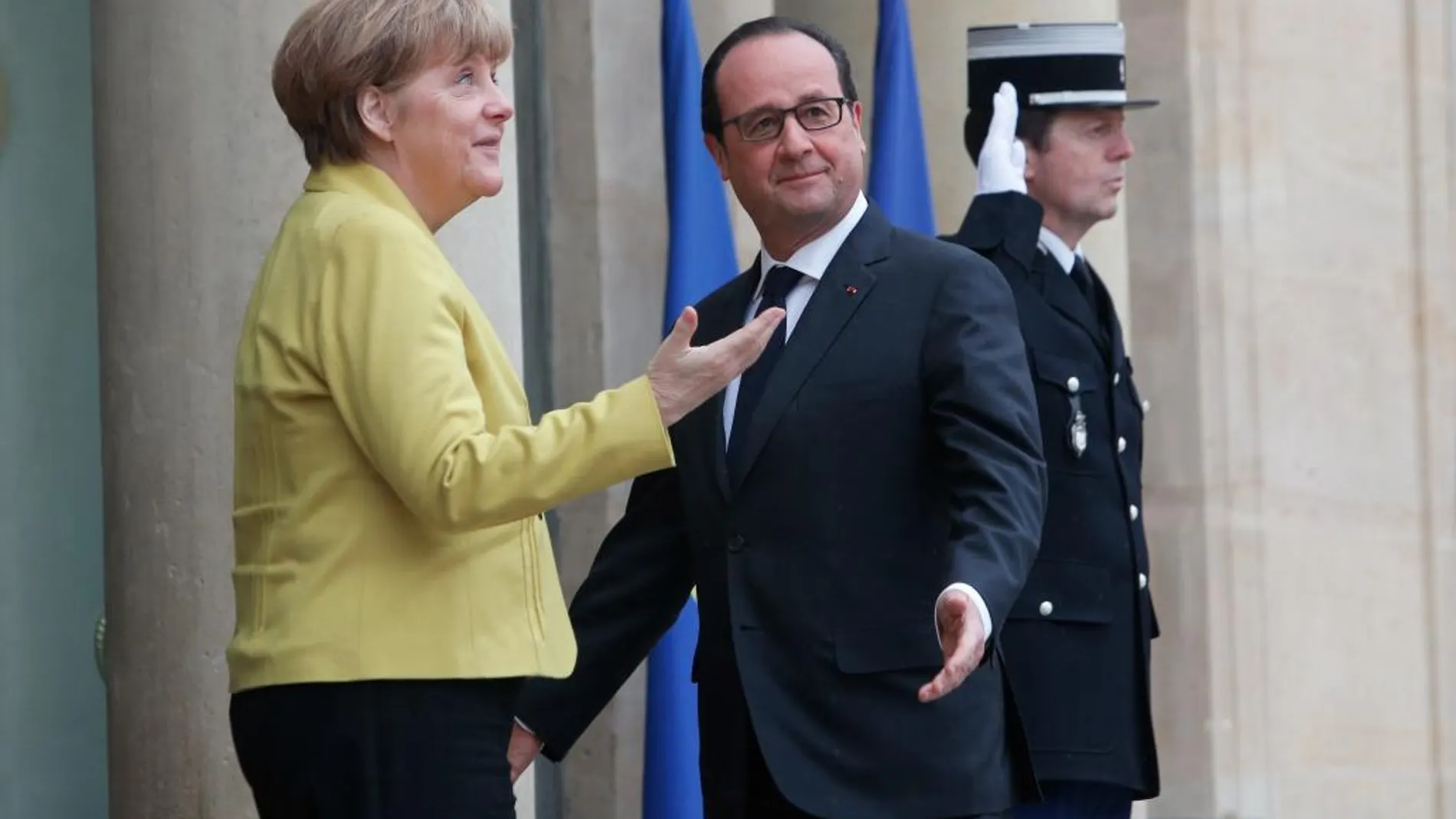 François Hollande y Angela Merkel, en París