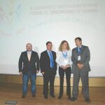 Bascuñana junto a sus compañeros en la mesa de debate y el gerente de Fundown Región de Murcia