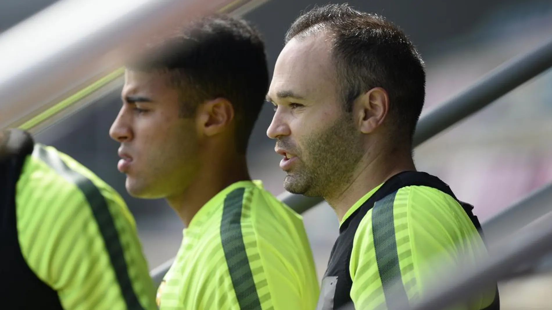 Andres Iniesta y Rafinha, en un entrenamiento