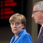 Angela Merkel y Jean-Claude Juncker en Bruselas