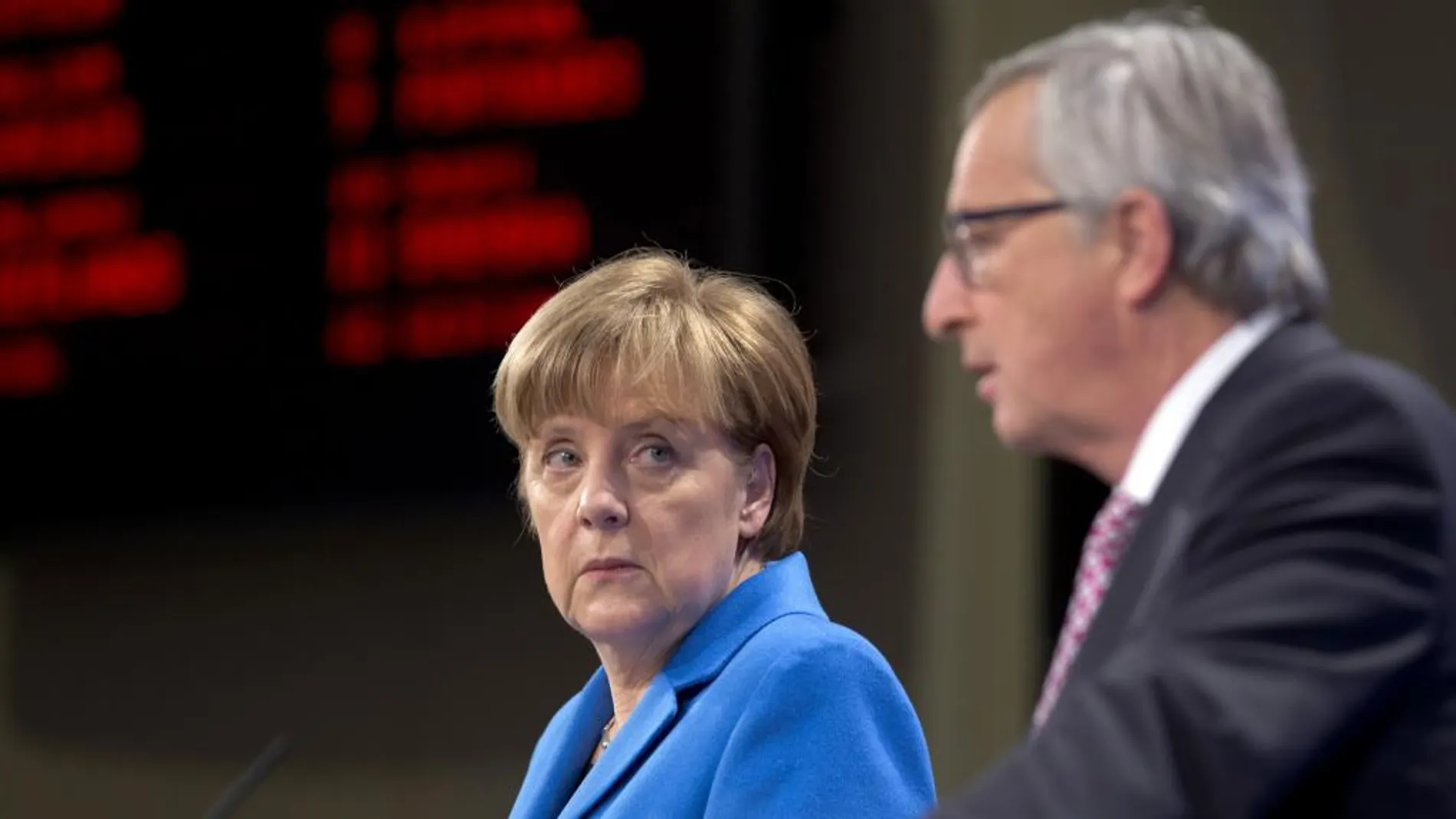 Angela Merkel y Jean-Claude Juncker en Bruselas