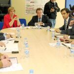 De Santiago-Juárez y María Jesús Ruiz, en la reunión de la Comisión de Coordinación Territorial