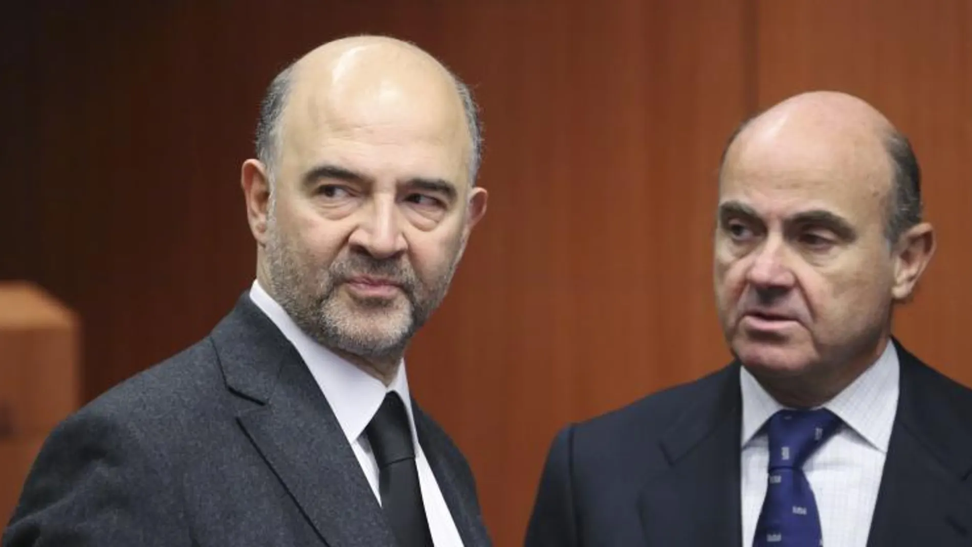 Pierre Moscovici y Luis de Guindos
