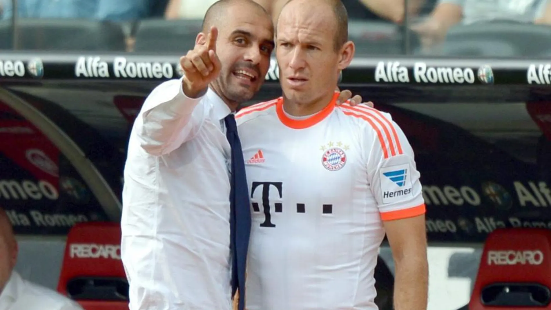 Pep Guardiola, junto a Robben.