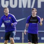 Luis Suárez y Messi, en el entrenamiento de ayer