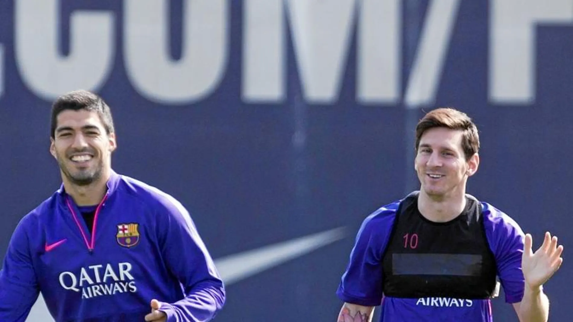 Luis Suárez y Messi, en el entrenamiento de ayer