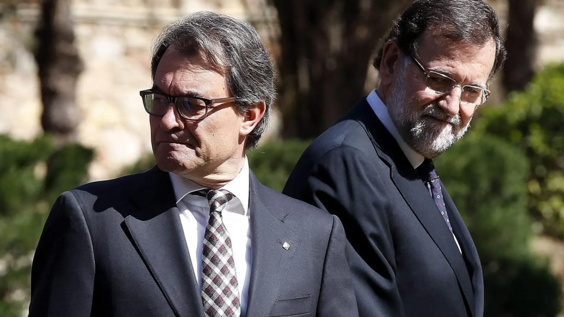 El presidente del Gobierno, Mariano Rajoy, junto al presidente de la Generalitat, Artur Mas