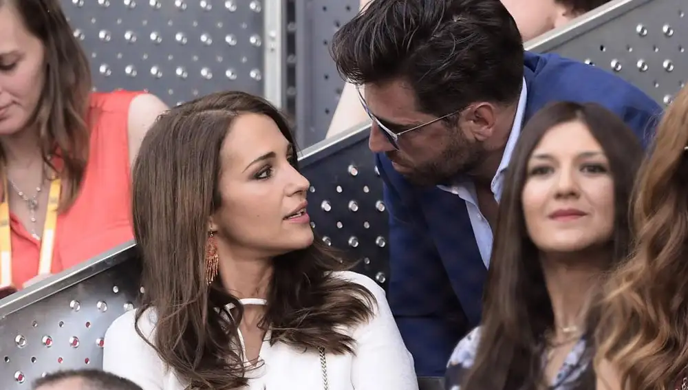 Paula Echevarría y David Bustamante durante la final del torneo de tenis de Madrid