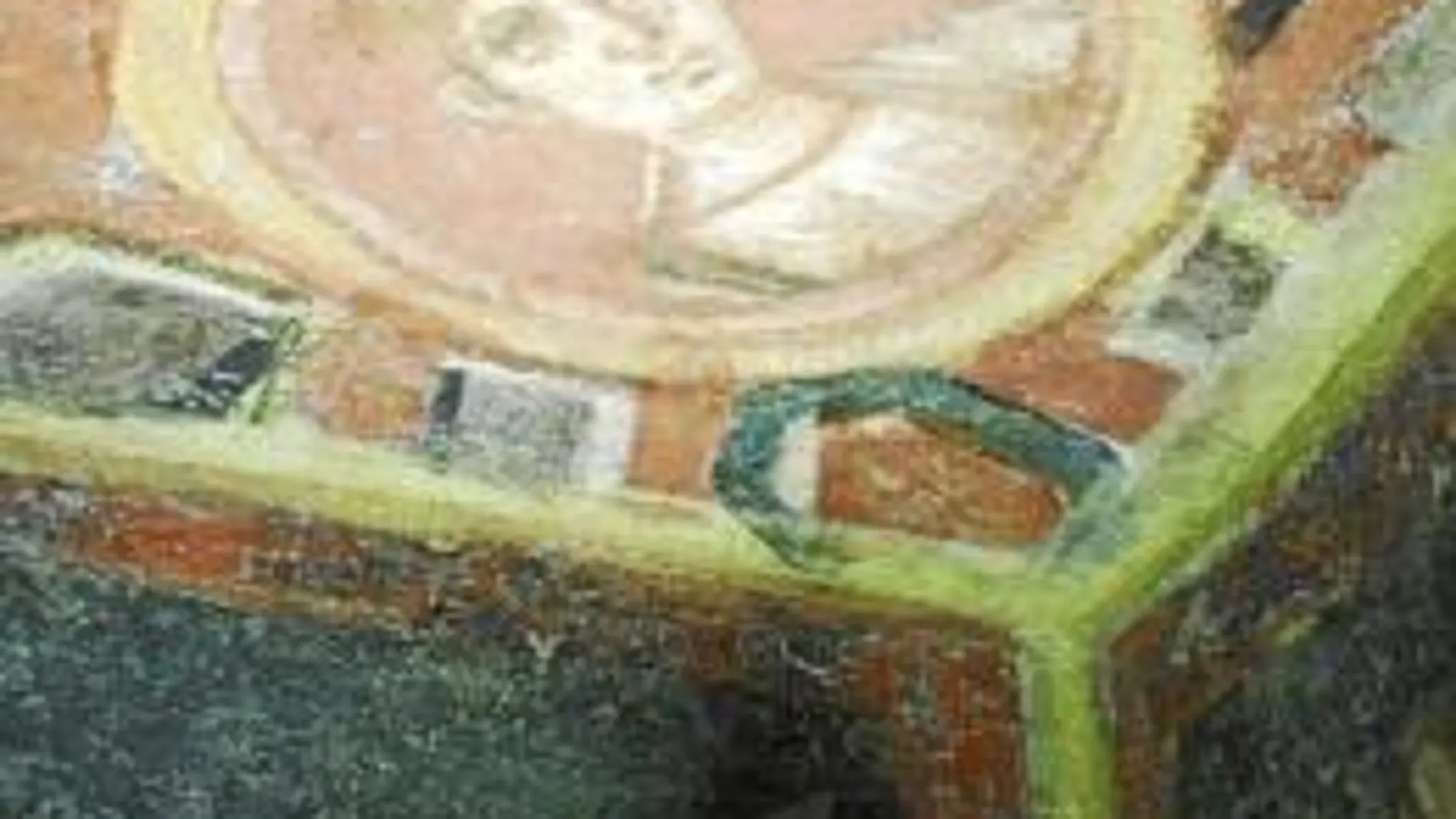 Medallón del siglo IV, descubierto en las catacumbas de santa Tecla, el primero que representa al evangelista san Juan.