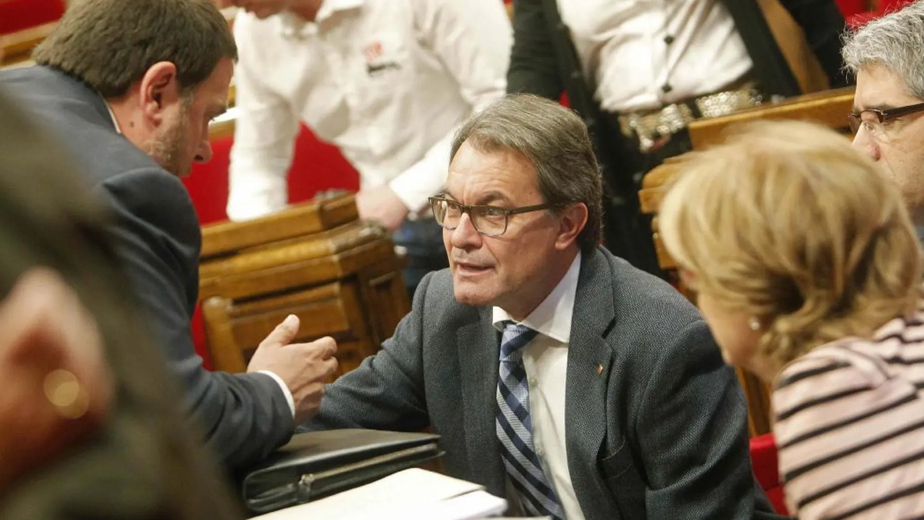 El presidente de la Generalitat, Artur Mas, con el líder de ERC, Oriol Junqueras