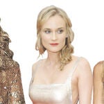 De izquierda a derecha, la modelo Iman con un mono dorado, Diane Kruger y Gwyneth Paltrow