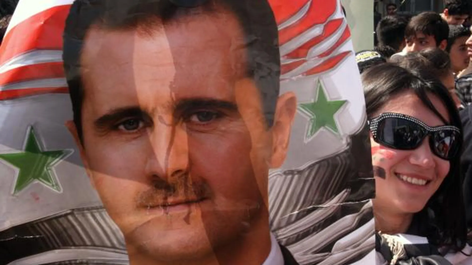 Una simpatizante del presidente sirio, Bashar al Asad