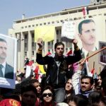 Las protestas en confra y al favor del presidente sirio recorren el país