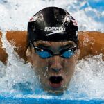 Phelps gana en los 100 mariposa su tercera medalla de oro en Shanghái