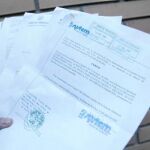 Documentos de System, en los que aparecen datos de sus responsables