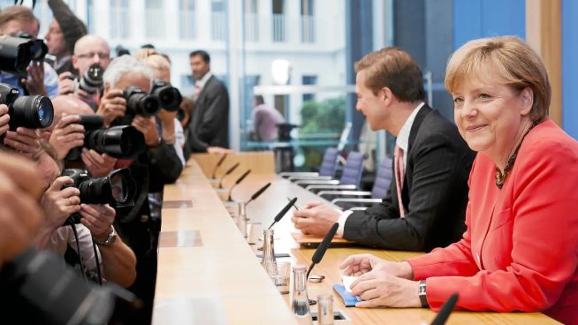 La canciller alemana, Angela Merkel, informó ayer en Berlín sobre el resultado de la cumbre en medio de una gran expectación