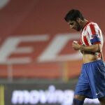El delantero del Atlético Madrid, Raúl García lamenta perder por 2-0 ante el Académica
