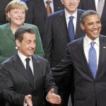 Nicolas Sarkozy, junto a Angela Merkel y Barack Obama, en la cumbre
