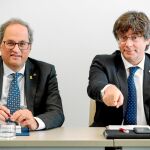 Quim Torra y Carles Puigdemont encabezaron ayer la reunión de JxCat en Bruselas