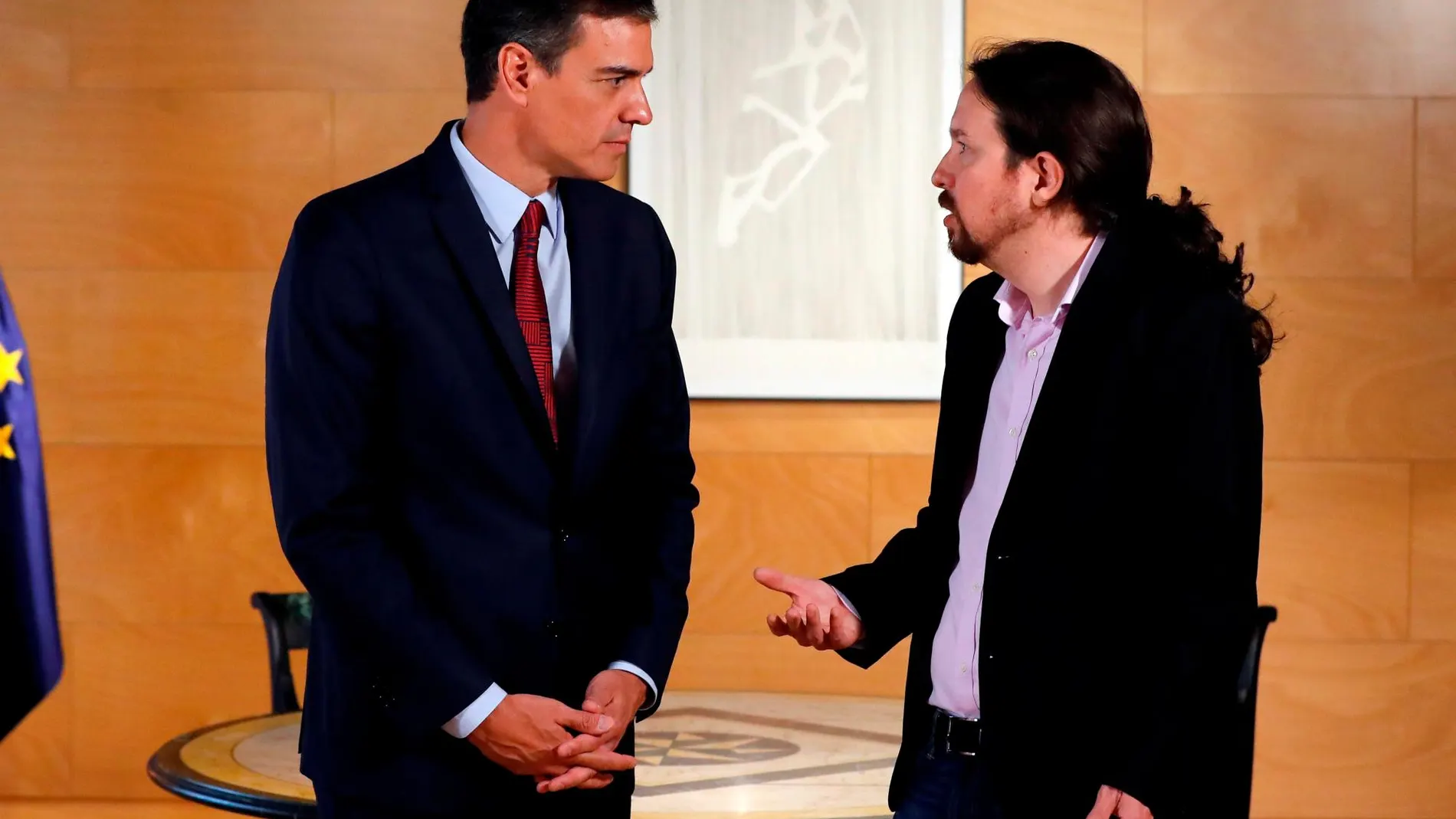 El presidente del gobierno en funciones, Pedro Sánchez, y el líder de Podemos, Pablo Iglesias