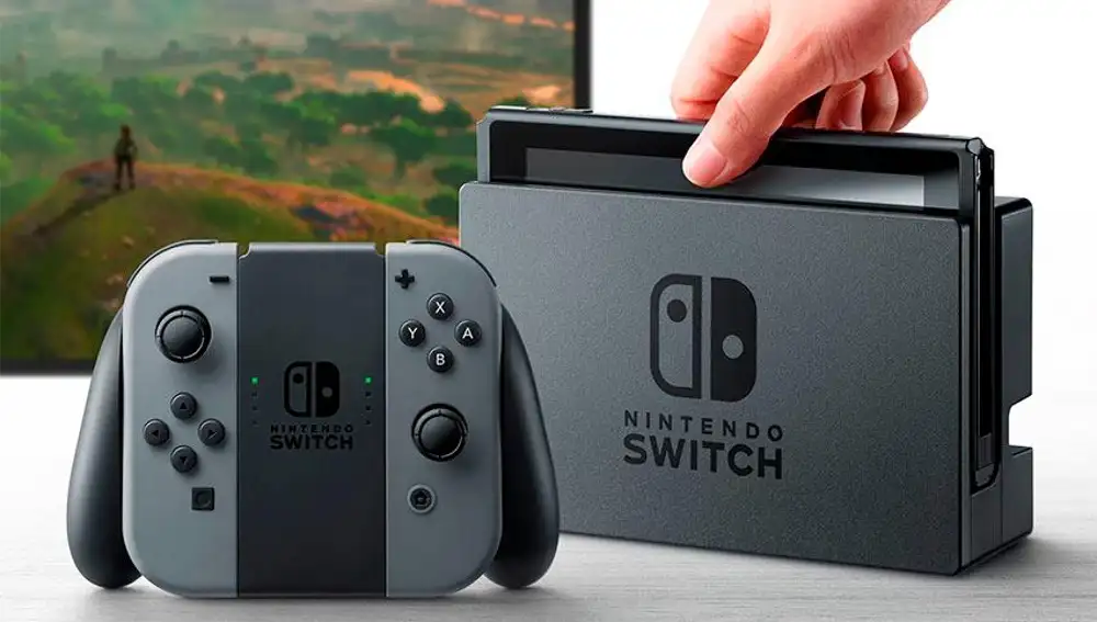 Nintendo Switch en su &quot;dock&quot; y controlador Joy-Con en formato &quot;gamepad&quot; tradicional con el complemento Grip.