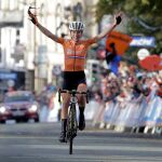 Annemiek van Vleuten, of The Netherlands, celebrates as she crosses the finish line to win the women elite race, at the road cycling World Championships in Harrogate, England, Saturday, Sept. 28, 2019. (AP Photo/Manu Fernandez)