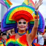 [A participant takes part in the annual Christopher Street Day (CSD) Gay Pride parade, in Cologne]