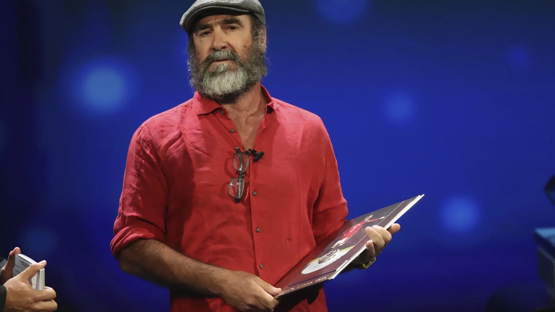 [French former soccer star Eric Cantona receives the UEFA President's Award during the Champions]