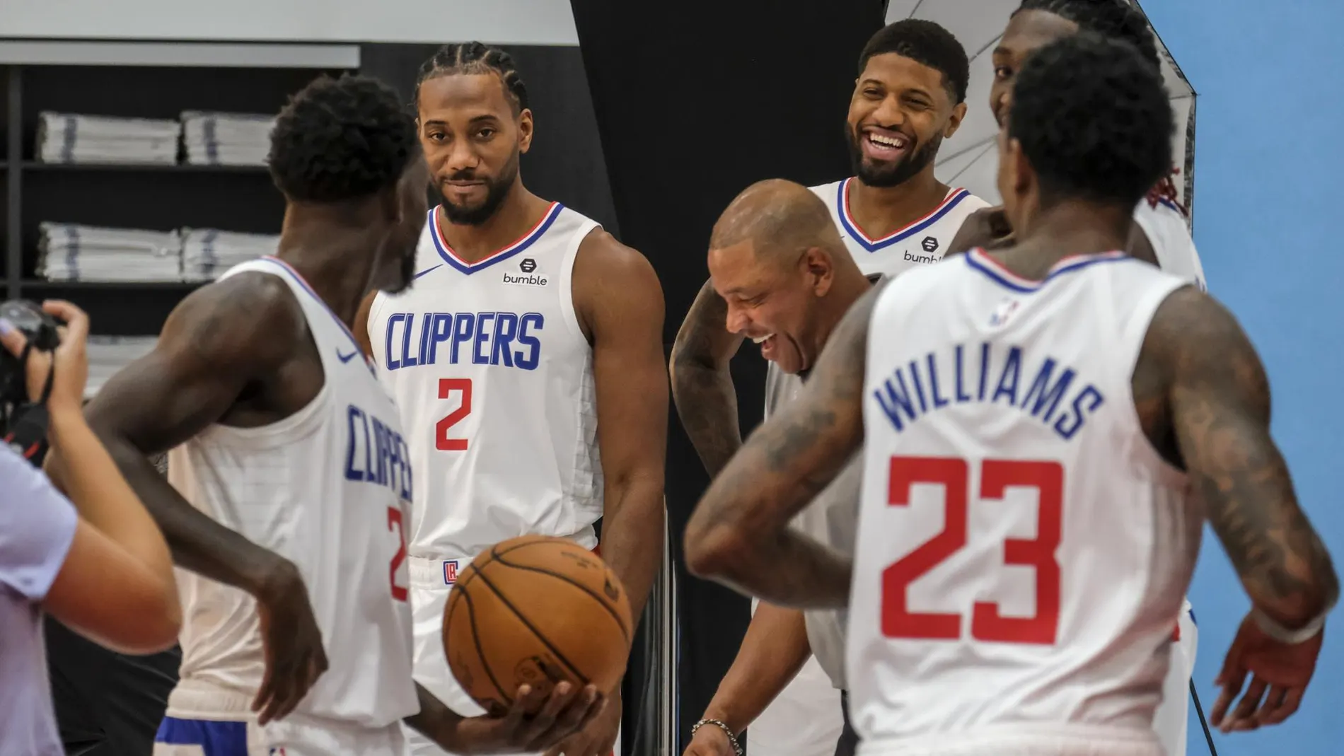 [teammates for photos during the NBA basketball team's media day in Los Angeles, Sunday, Sept. 29, 2019. (AP]