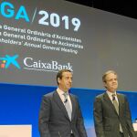 El consejero delegado de CaixaBank, Gonzalo Gortázar, y el presidente de la entidad, Jordi Gual