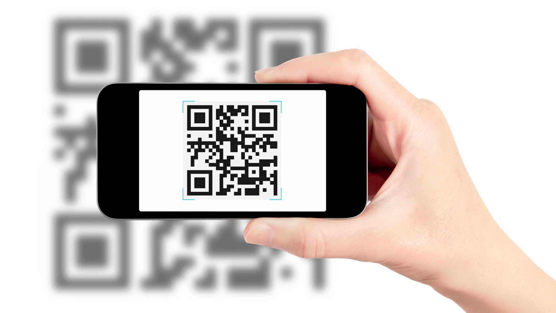 Scanning QR code with mobile smart phone. Isolated on white.