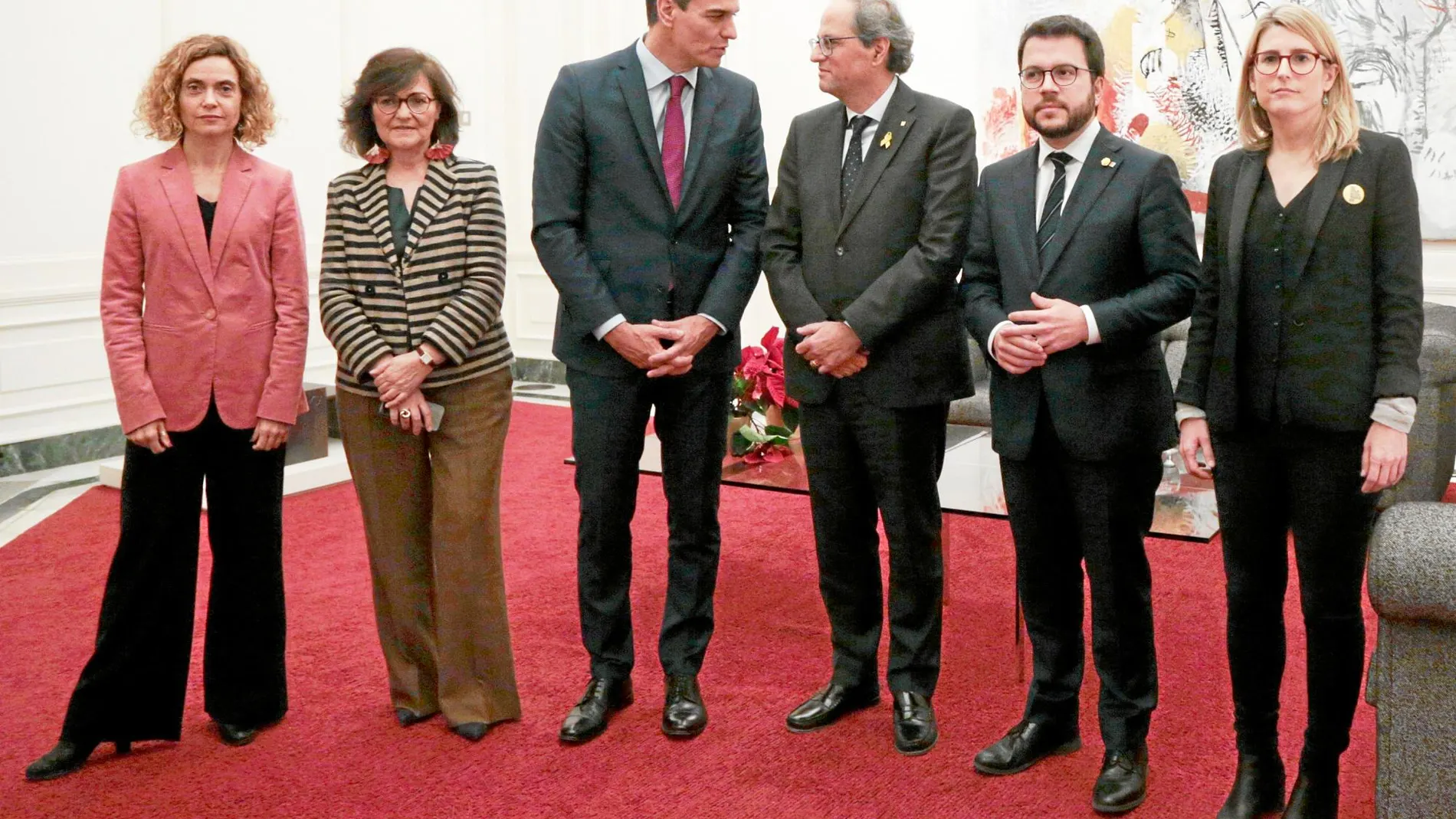 Quim Torra, junto al presidente del Gobierno, Pedro Sánchez, durante la celebración del Consejo de Ministros en Barcelona el 21 de diciembre del pasado año
