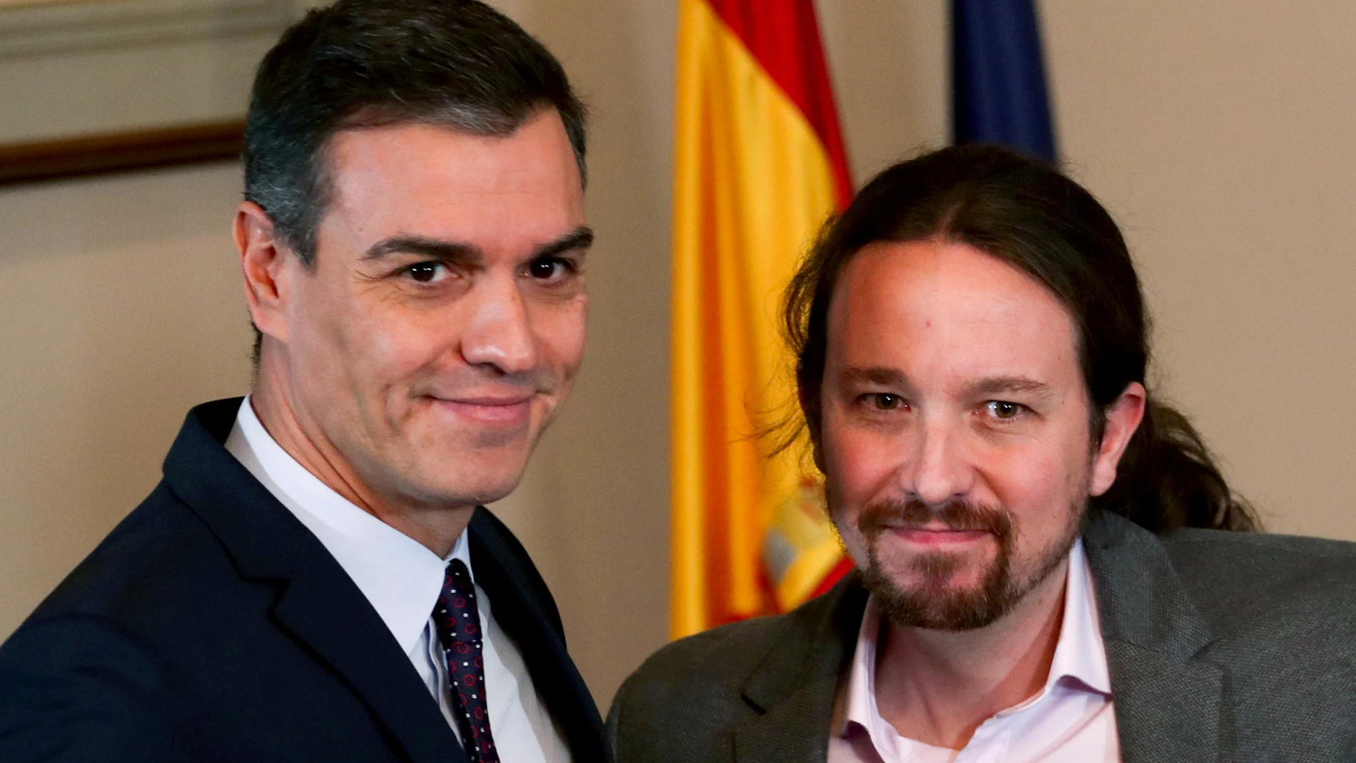 FILE PHOTO: Spain's acting PM Sanchez and Unidas Podemos leader Pablo Iglesias meet in Madrid