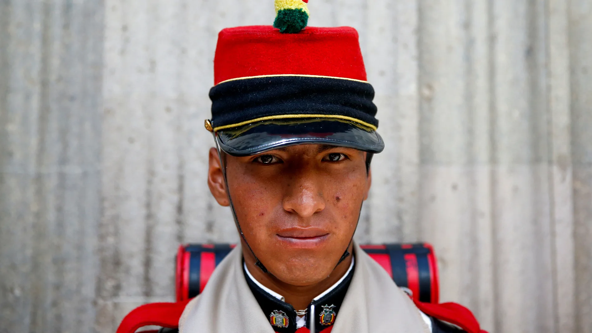 A member of Bolivia's presidential guard stands outside the presidential palace in La Paz