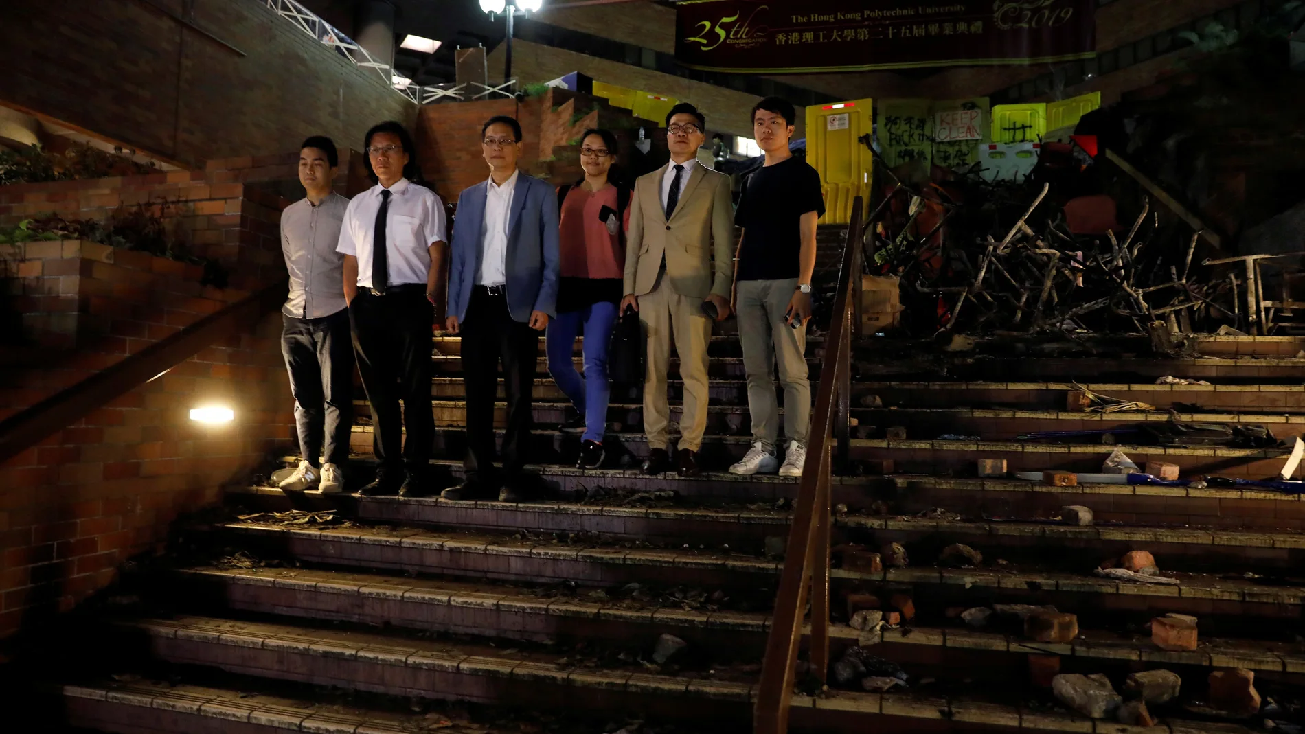 Pro-democratic lawmakers are pictured after meeting with protesters at the Polytechnic University (PolyU) in Hong Kong