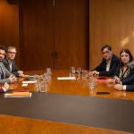 Representantes de PSOE, PSC y ERC durante la negociación