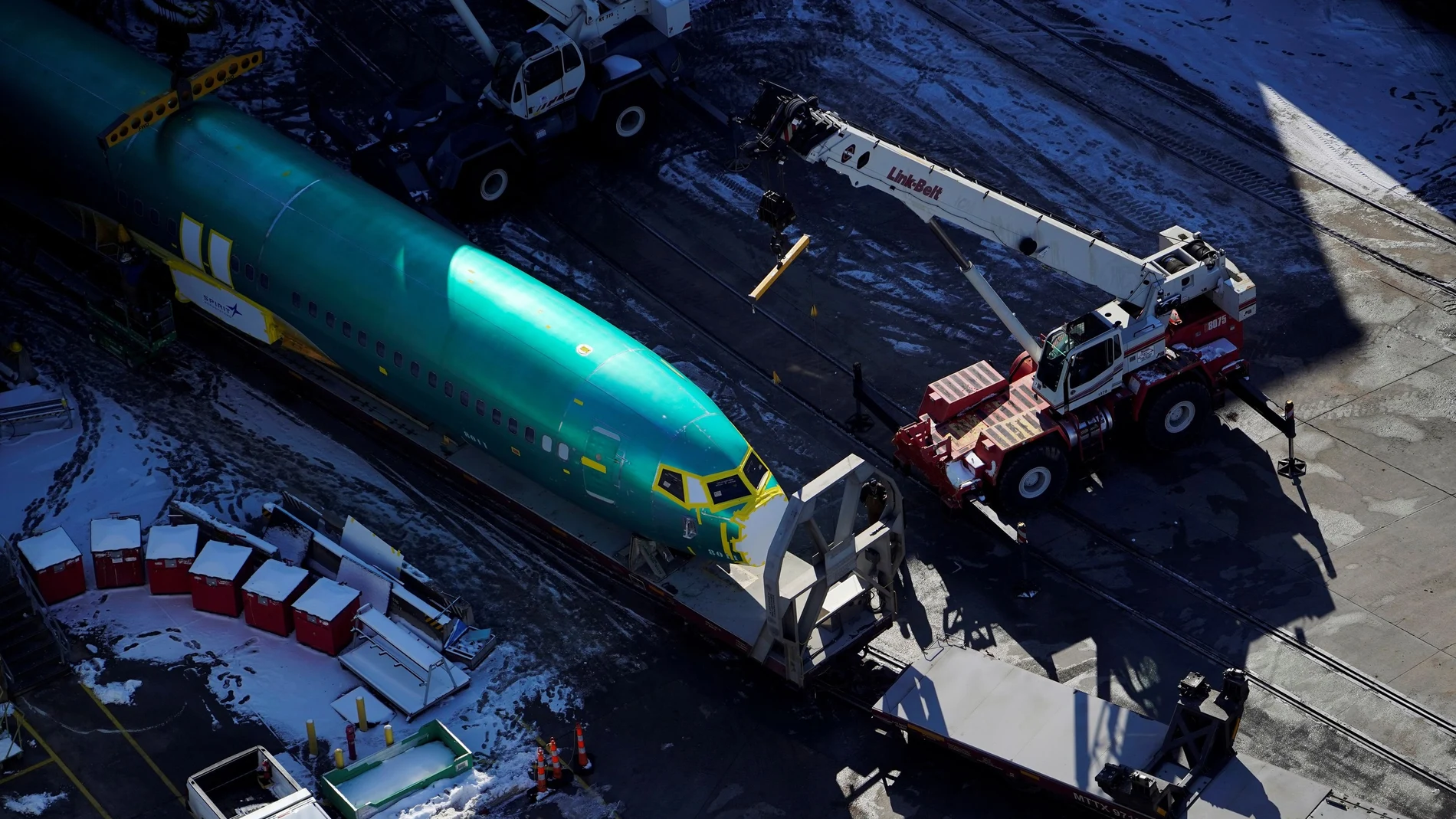 An airplane fuselage for Boeing's 737 Max is unloaded from a rail car at their top supplier, Spirit AeroSystems Holdings Inc, in Wichita