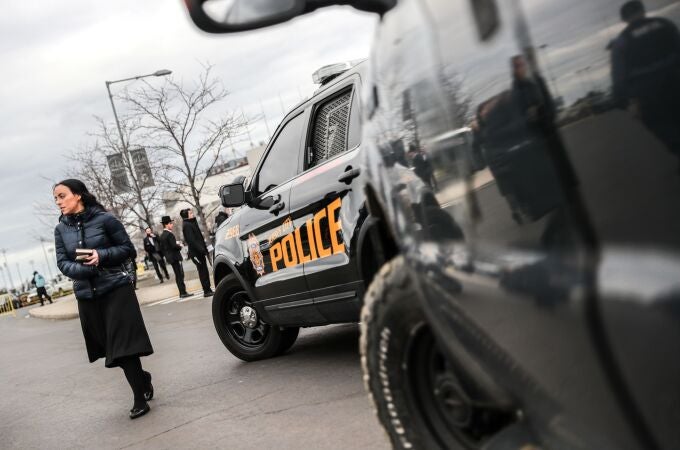 A New Jersey police vehicles are seen during the 13th Siyum HaShas, a celebration marking the completion of the Daf Yomi, a seven-and-a-half-year cycle of studying texts from the Talmud, the canon of Jewish religious law, at the MetLife Stadium in East Ru