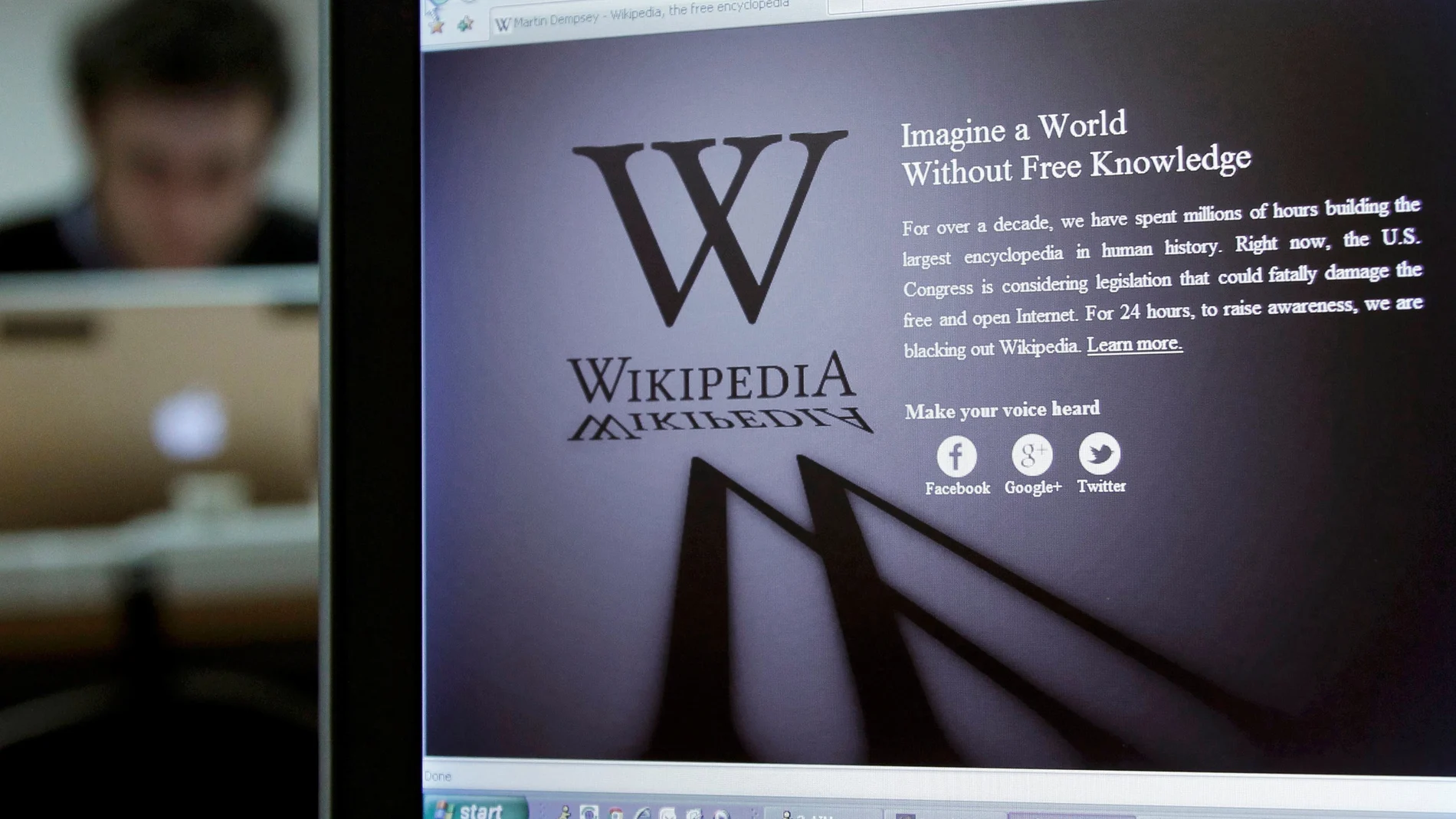 FILE PHOTO: A reporter's laptop shows the Wikipedia blacked out opening page in Brussels