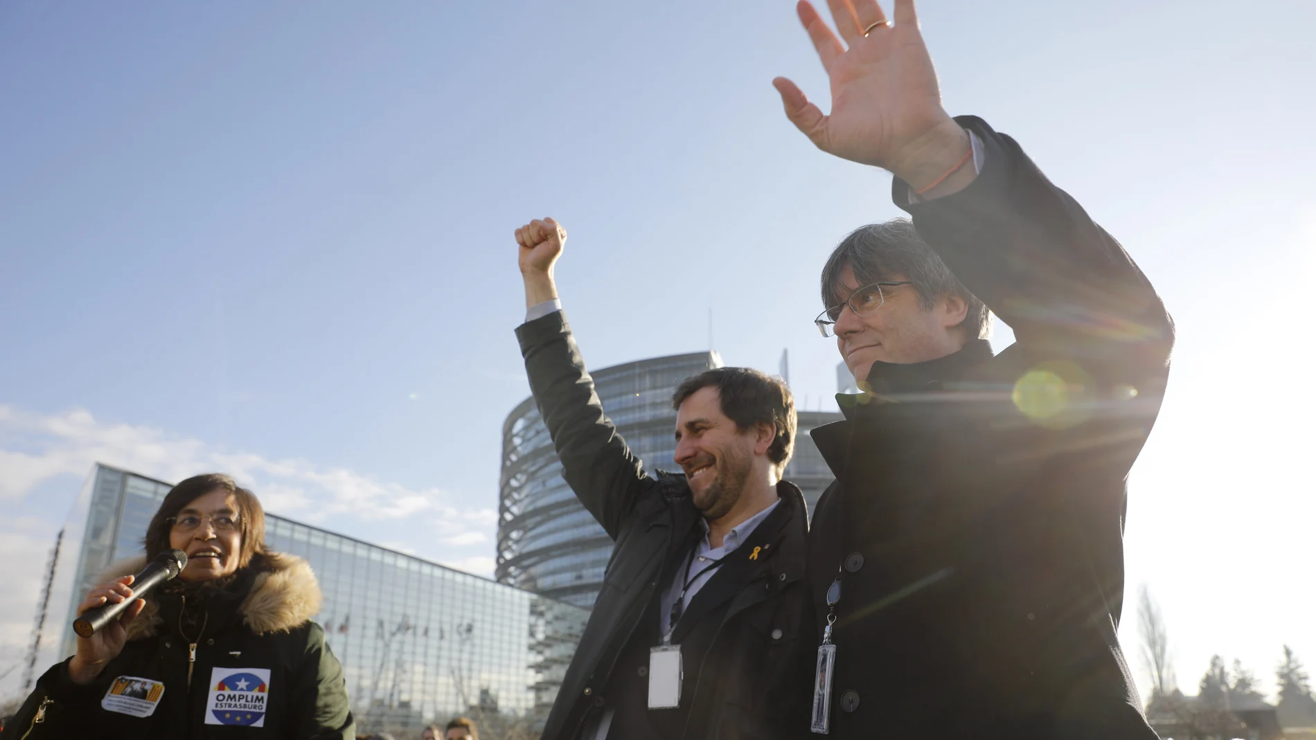 Catalan leader Carles Puigdemont, right, and former Catalan regional minister Antoni Comin react outside the European Parliament Monday Jan.13 2020 in Strasbourg, eastern France. Catalan leader Carles Puigdemont is expected to attend his first session as a member of the European Parliament on Monday despite facing an arrest warrant against him in Spain.(AP Photo/Jean-Francois Badias)