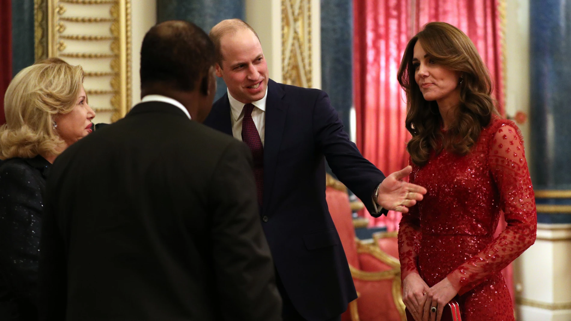 El príncipe Guillermo y Kate Middleton, durante la recepción en el Palacio de Buckingham