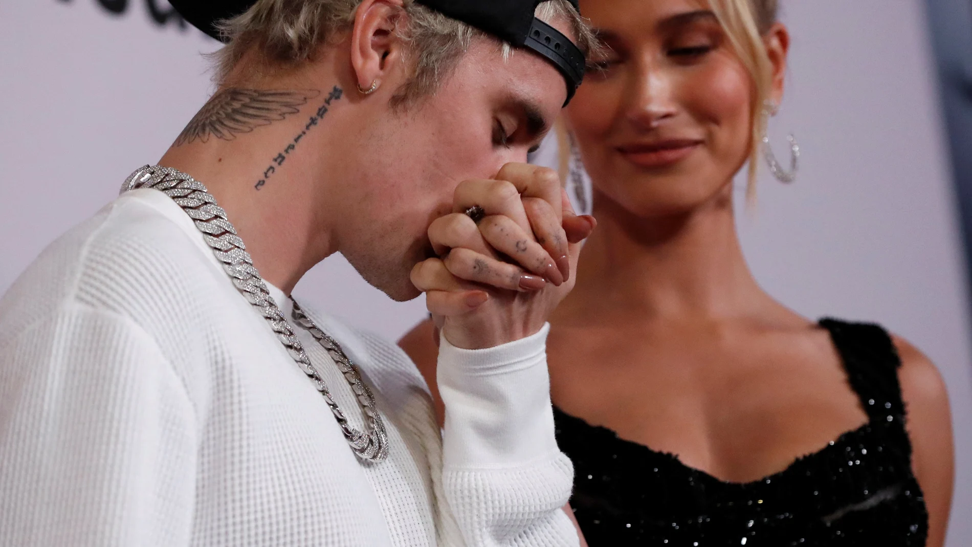 Singer Bieber kisses the hand of his wife Hailey Baldwin at the premiere for the documentary television series "Justin Bieber: Seasons" in Los Angeles