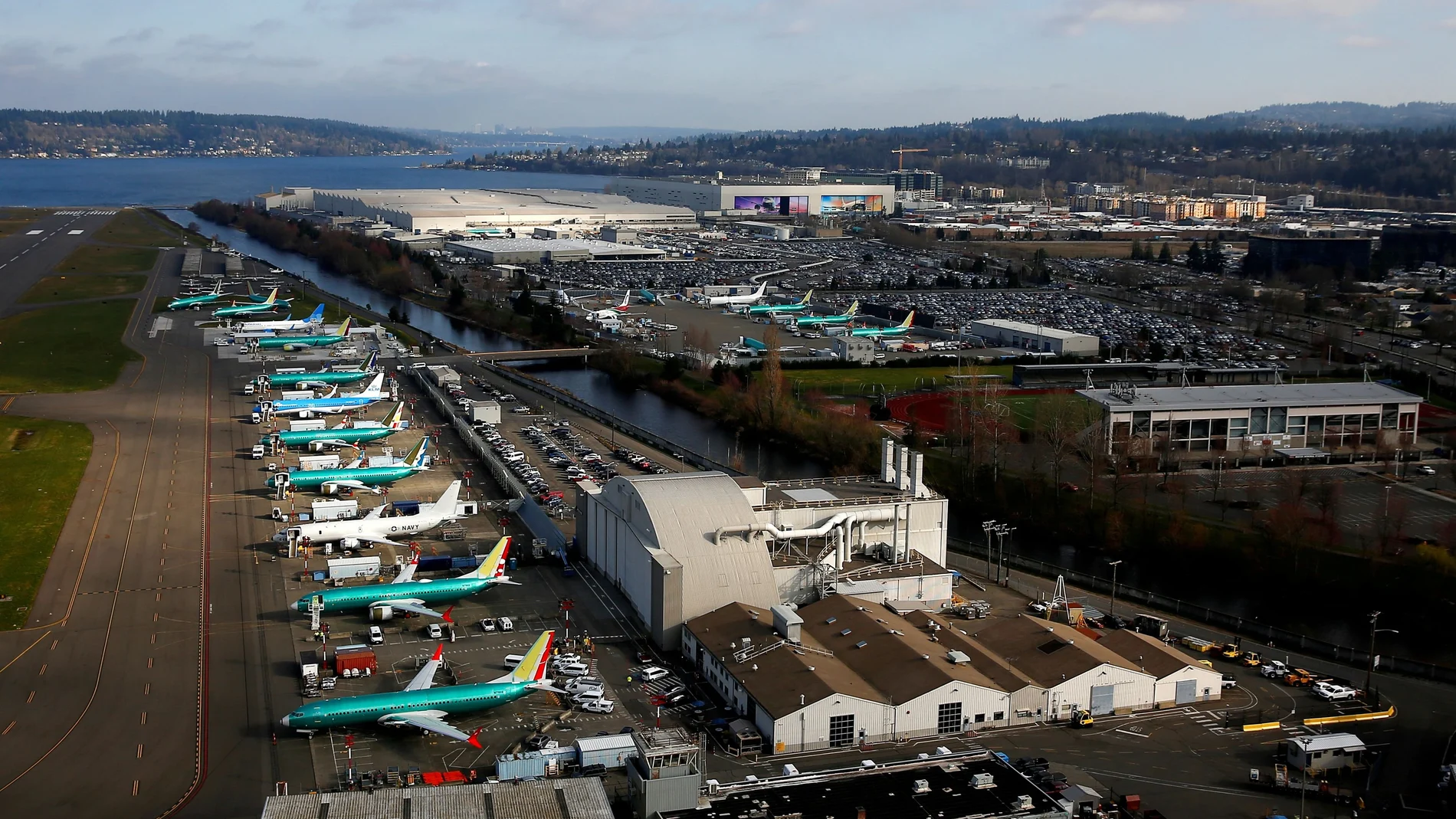 FILE PHOTO: An aerial photo shows Boeing airplanes, many 737 MAXs, parked on the tarmac at the Boeing Factory in Renton