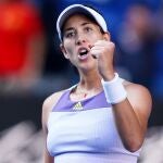 La tenista española Garbiñe Muguruza celebra su victoria ante la rumana Simona Halep
