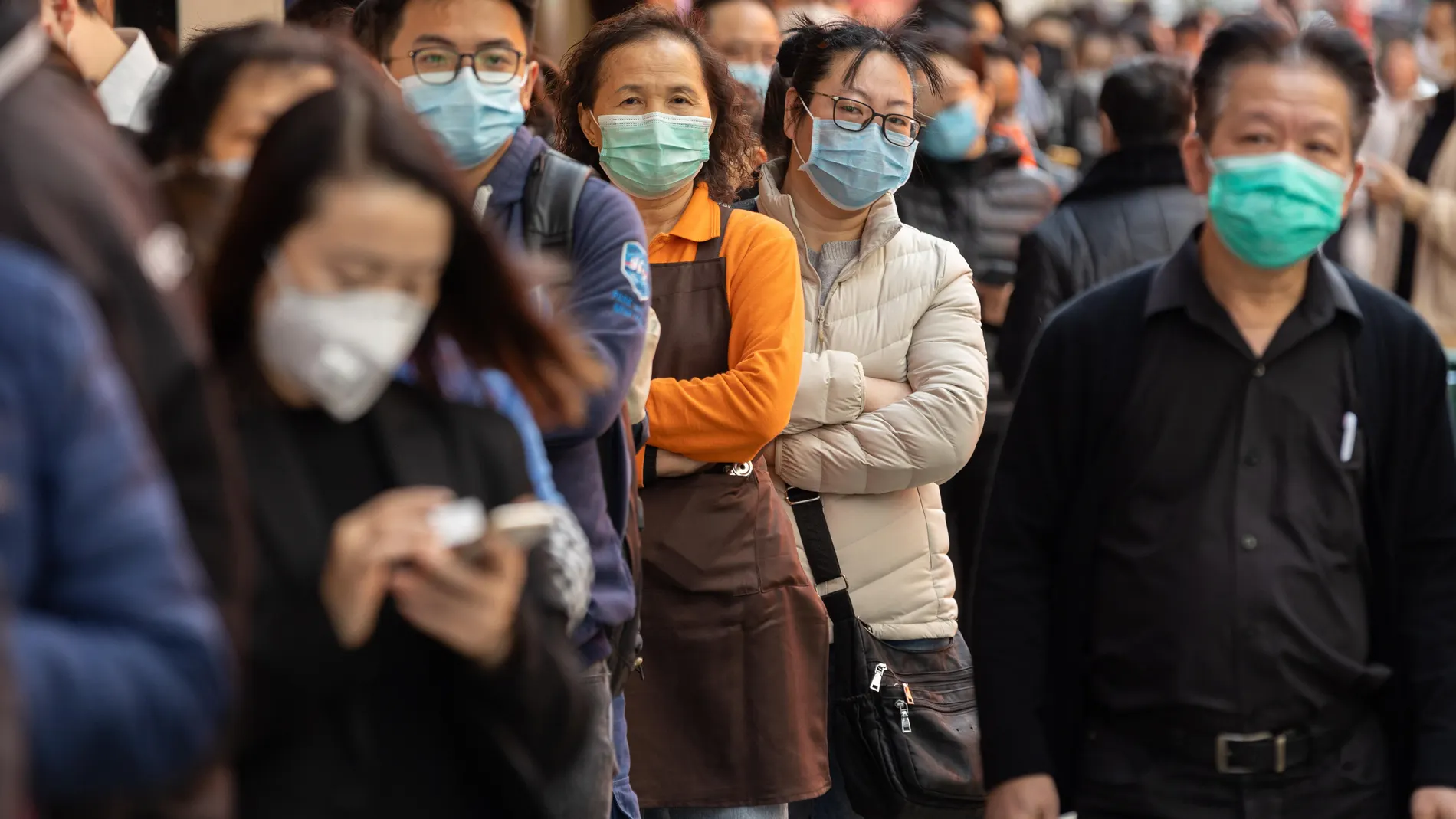 Long queues outside pharmacies as coronavirus fear spreads in Hong Kong