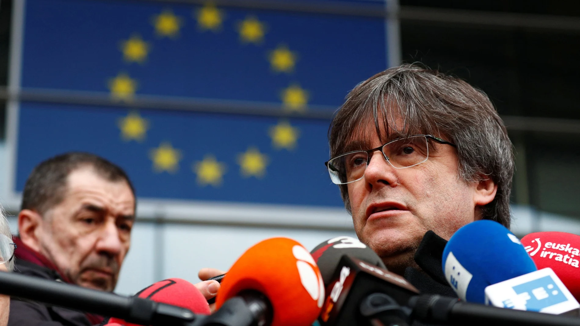 Former member of the Catalan government Puigdemont speaks to the media outside the EU Parliament in Brussels
