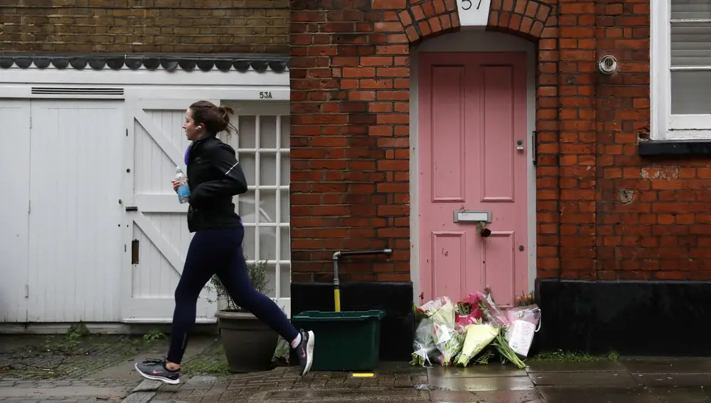 Flowers lie outside British television presenter Caroline Flack's old house in Islington, London, Britain February 16, 2020. REUTERS/Simon Dawson